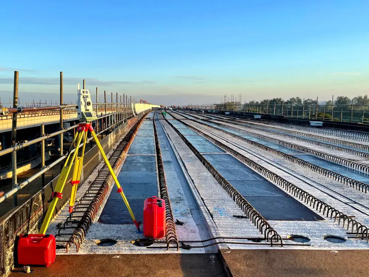 Bridge deck beams with survey control