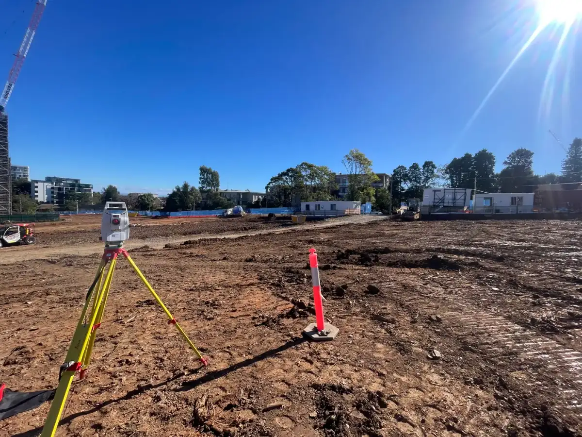 Cleared subdivision site with survey marks