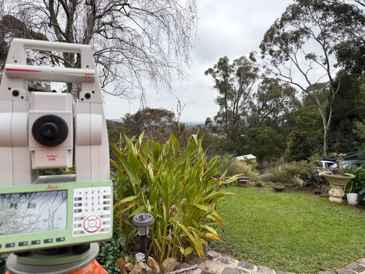 Total station set up in a rear garden