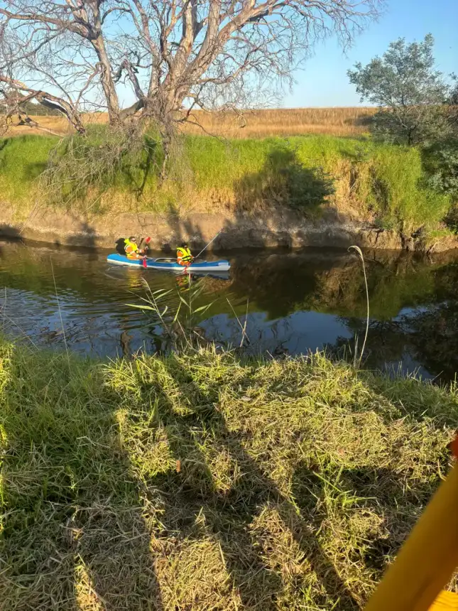 Surveying a waterway by kayak